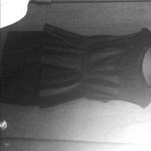 Black dress with a lace neckline